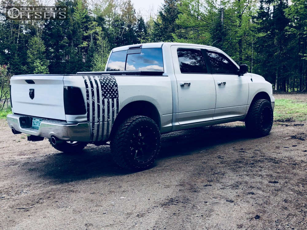 2011 Ram 1500 with 20x12 44 Moto Metal MO970 and 33/12.5R20 Atturo