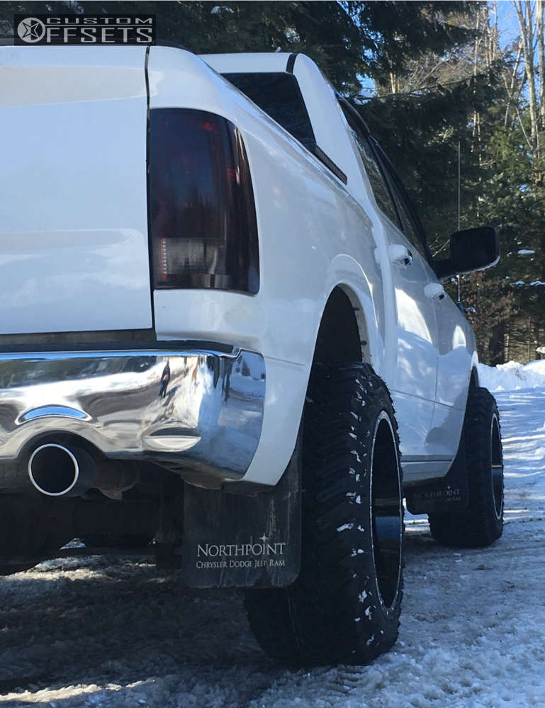 2011 Ram 1500 with 20x12 44 Moto Metal MO970 and 33/12.5R20 Atturo