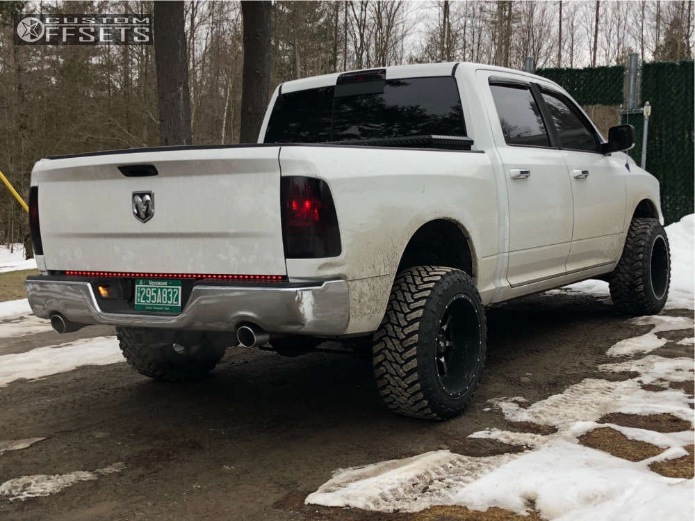 2011 Ram 1500 with 20x12 44 Moto Metal MO970 and 33/12.5R20 Atturo