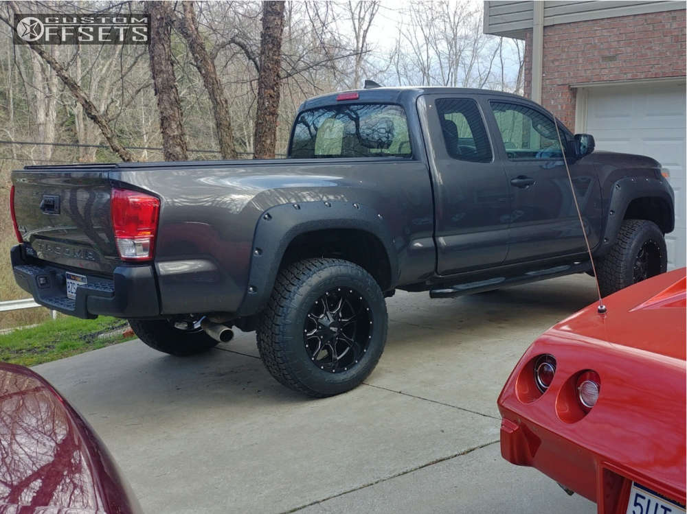 2016 Toyota Tacoma with 18x10 -24 Moto Metal Mo970 and 265