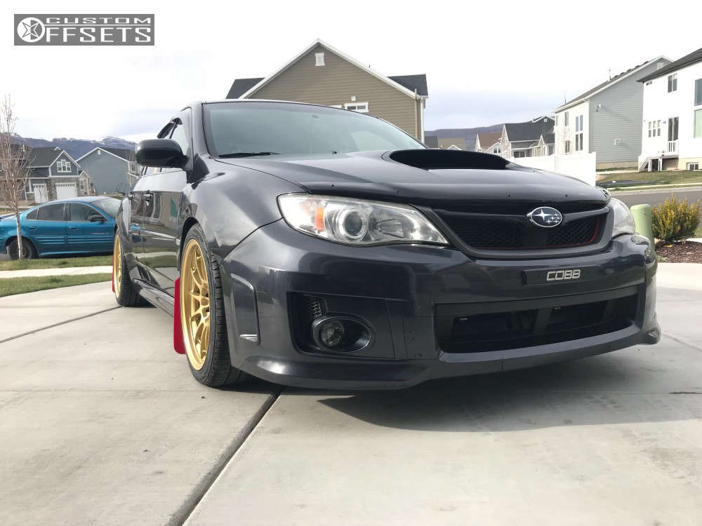 2012 Subaru WRX with 18x9.5 40 Enkei Nt03 and 265/35R18 Hankook