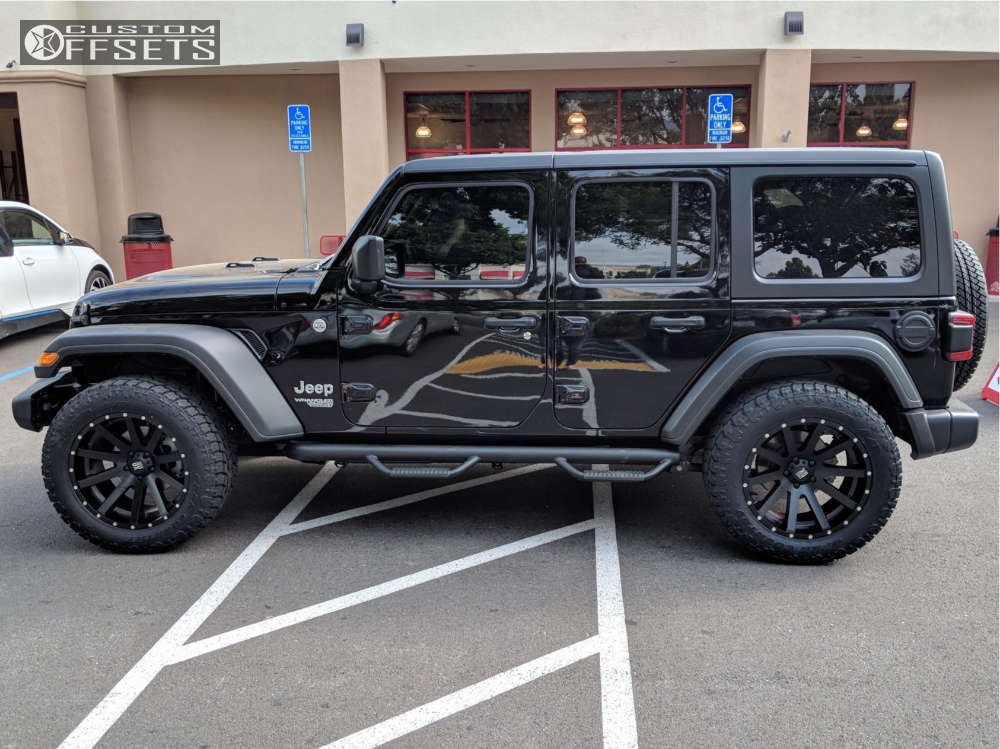 2018 Jeep Wrangler with 20x10 -24 XD Heist and 33/ Toyo Tires Open  Country A/T III and Stock | Custom Offsets