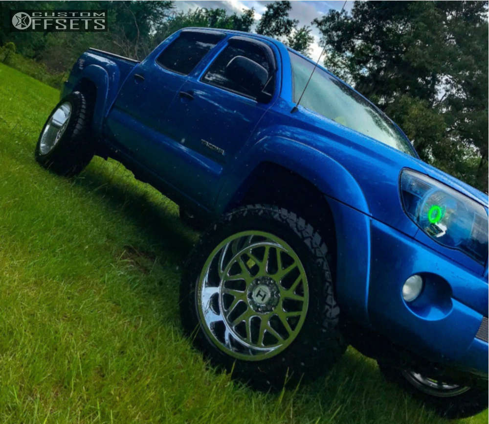 2008 Toyota with 20x12 44 Hostile Sprocket and 285/55R20 AMP