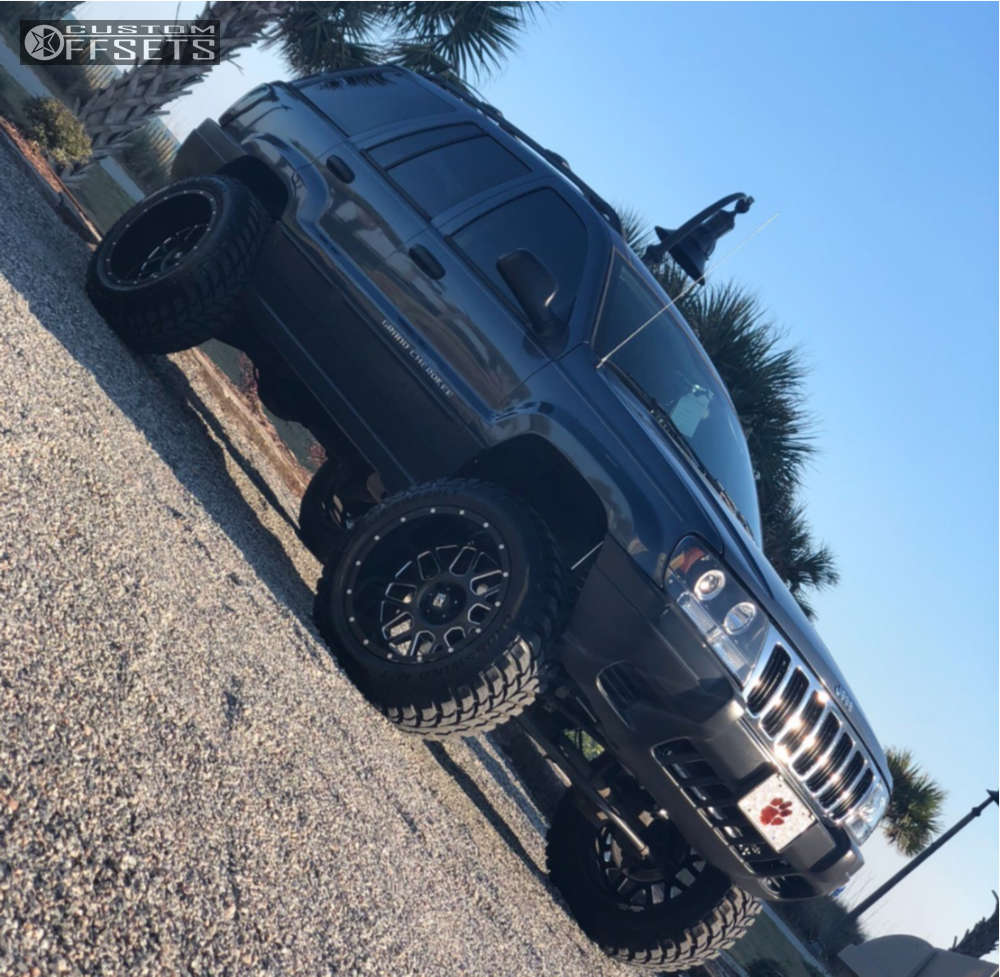 2003 Jeep Grand Cherokee with 20x12 -44 XD Xd820 and 33/12.5R20 Crosswind  M/t and Suspension Lift 4\, image size:1000x977