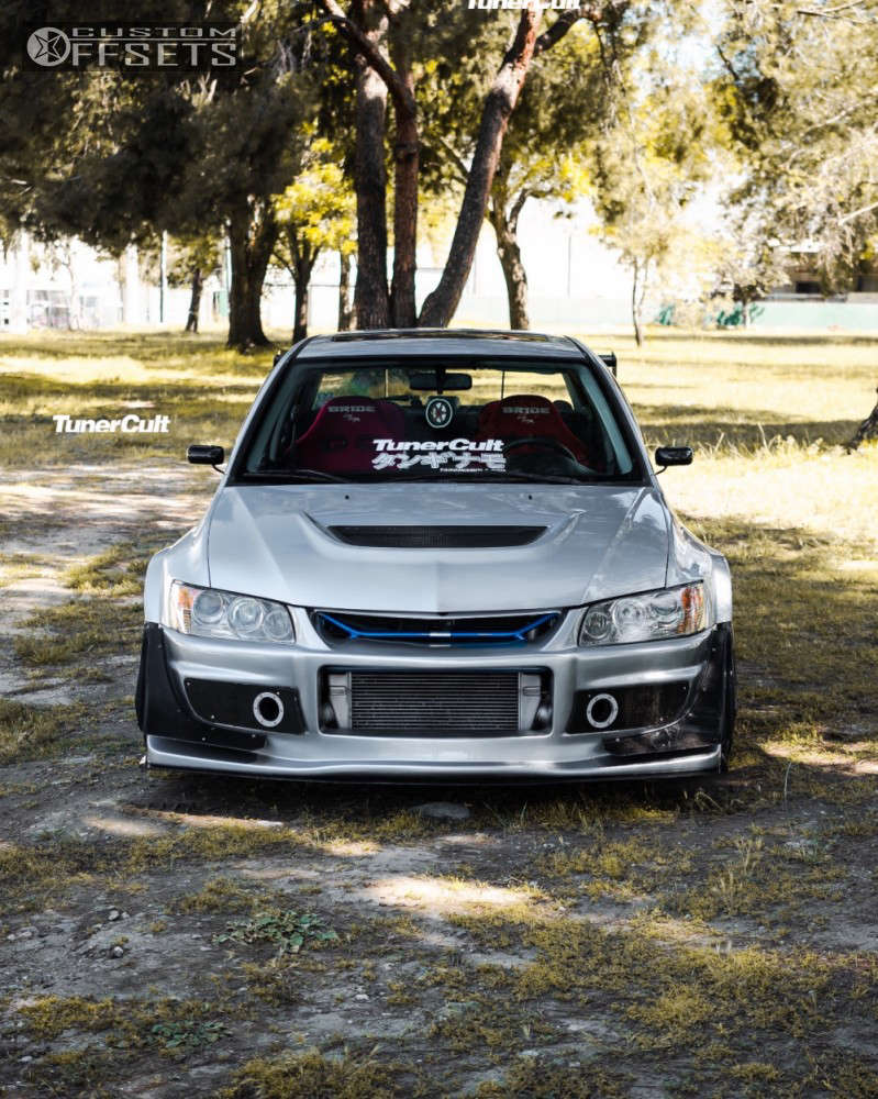 2004 Mitsubishi Lancer with 18x11 15 Advan TC3 and 285/35R18