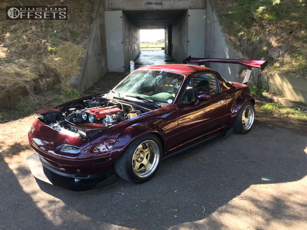 1995 Mazda MX-5 Miata with 15x9 -25 Work Meister S12p and 205