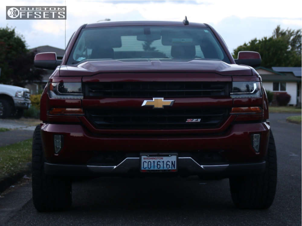 2016 Chevrolet C1500 with 20x12 -44 Hostile Sprocket and 295/55R20 Toyo ...