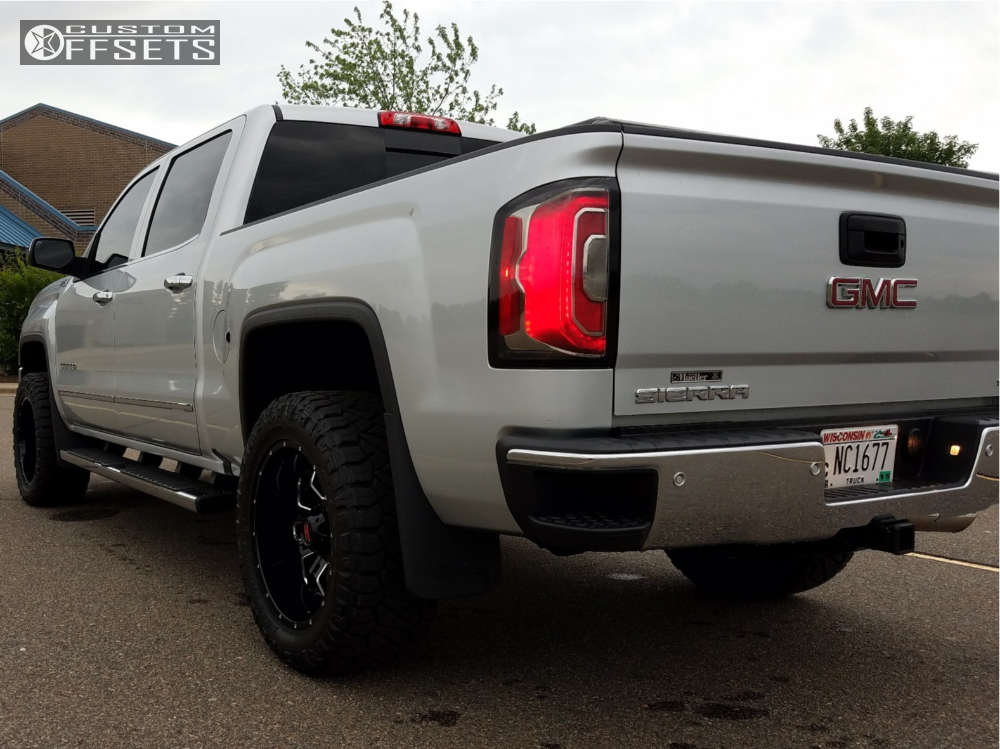 2016 GMC Sierra 1500 with 20x10 24 Havok H109 and 295/55R20 Nitto