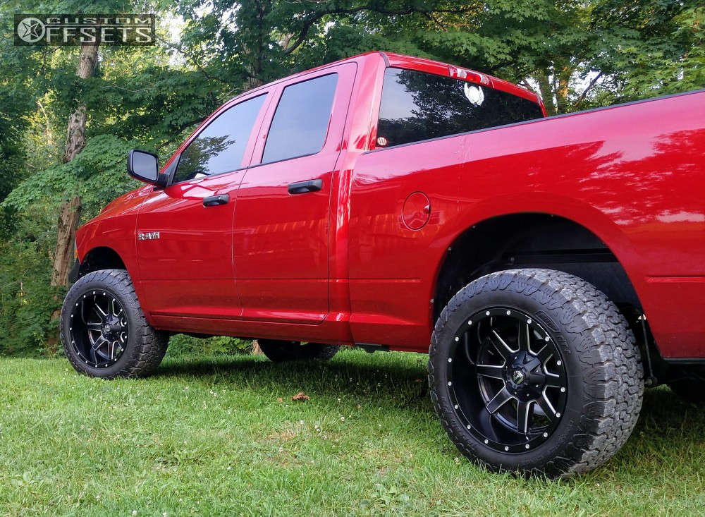 2009 Dodge Ram 1500 with 20x12 44 Fuel Maverick and 305/55R20 AMP Pro