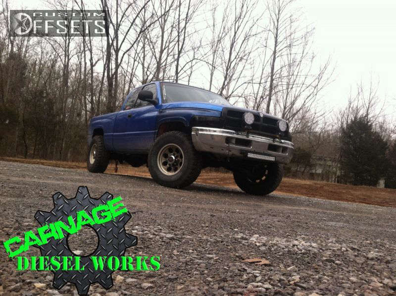 1999 Dodge Ram 2500 with 17x8.5 6 Level 8 Tracker and 35/12.5R17 Pro