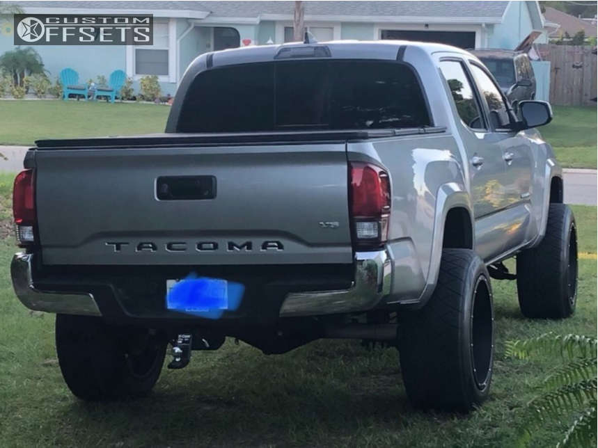 2018 Toyota with 20x12 51 Vision Rocker and 305/50R20 Nitto