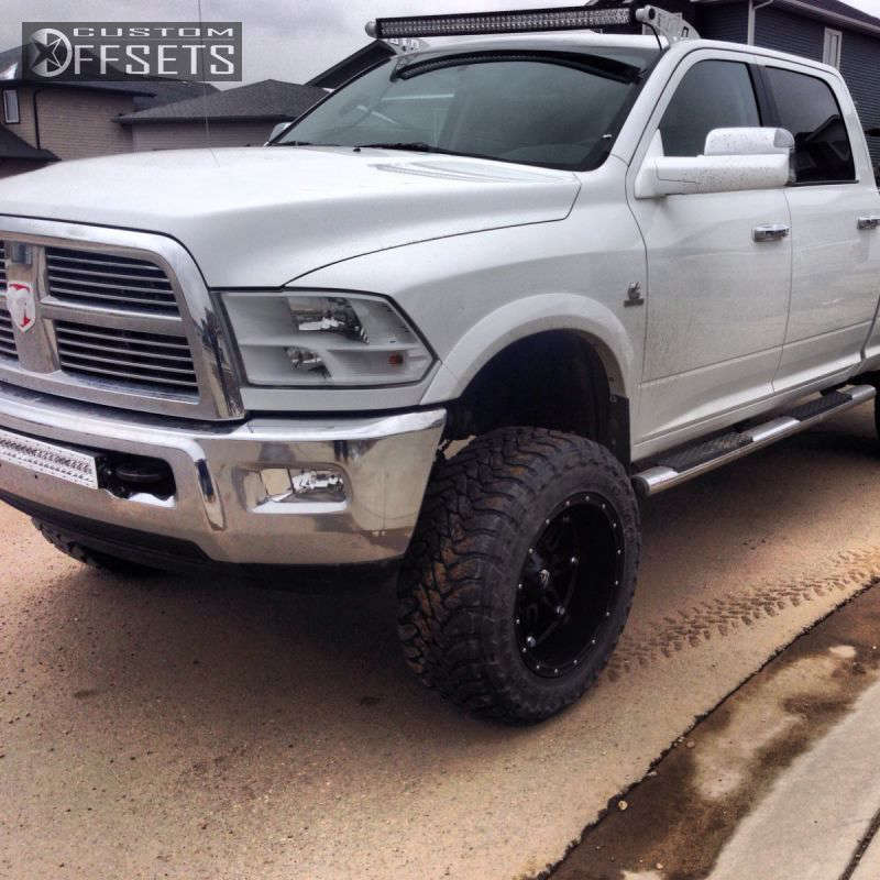 2012 Ram 2500 with 20x12 44 Fuel Hostage and 35/12.5R20 Toyo Tires