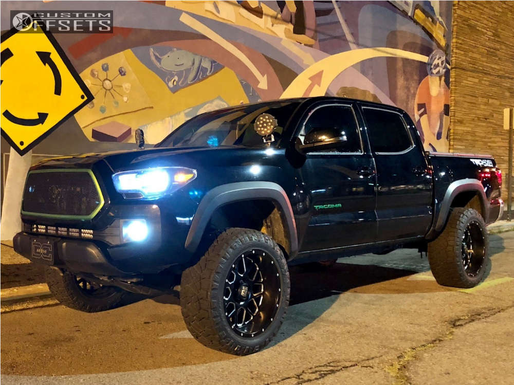 2016 Toyota with 20x10 24 XD XD820 and 275/55R20 Nitto Ridge