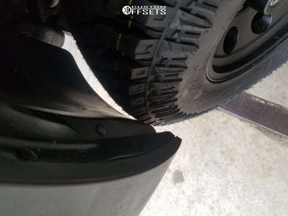 2002 Chevrolet Avalanche 1500 with 17x9 12 American Racing Baja and 35