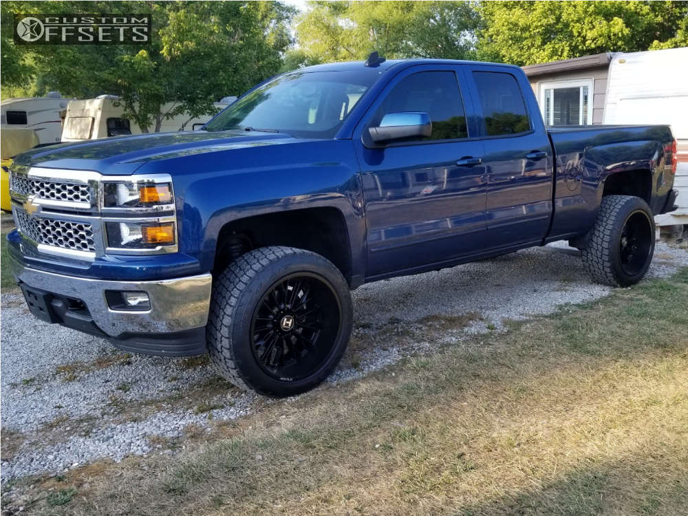 2015 Chevrolet Silverado 1500 with 22x12 -44 Hostile Fury and 33/12 ...