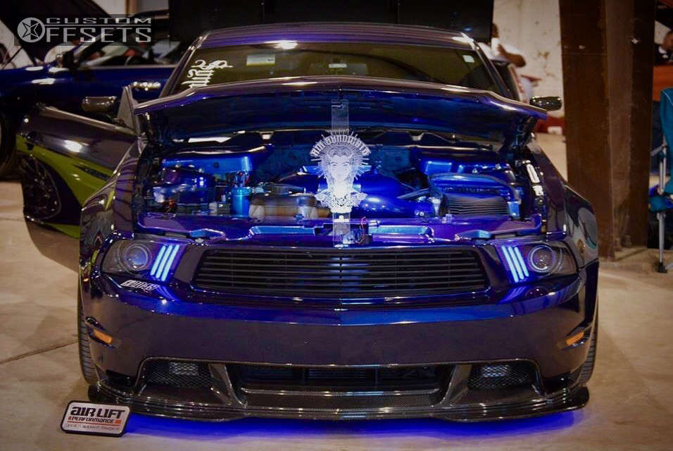 2012 Ford Mustang with 20x10.5 35 Rovos Durban and 265/30R20 Nitto Neo Gen and Air Suspension