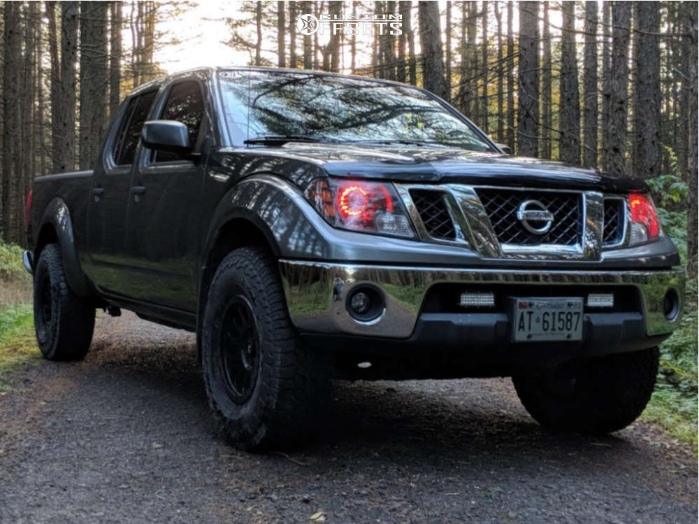 2009 Nissan Frontier with 16x8 15 Fuel Vector and 285/75R16 Falken Wildpeak At3w and Leveling