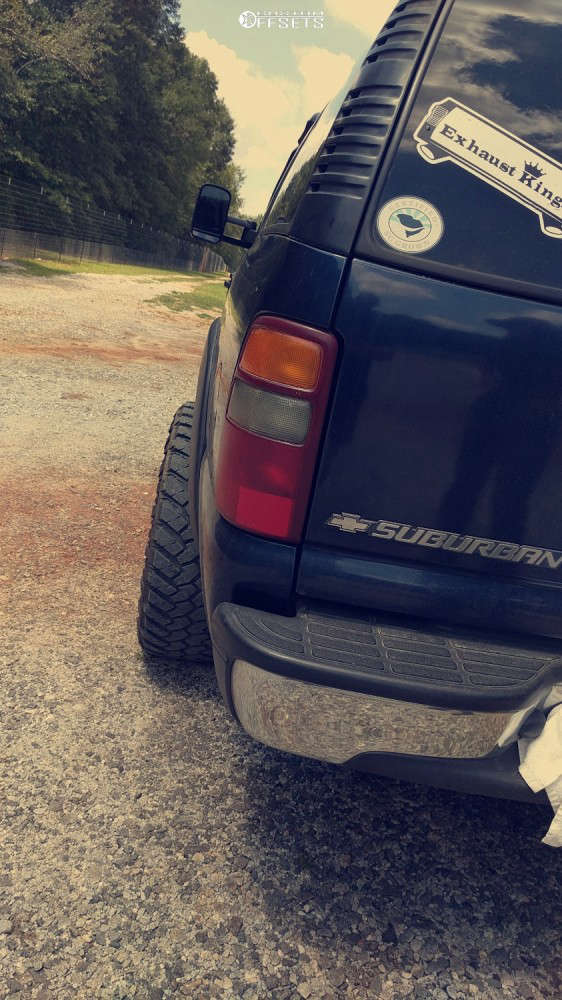 2002 Chevrolet Suburban 1500 with 18x9 -12 XD Badlands and