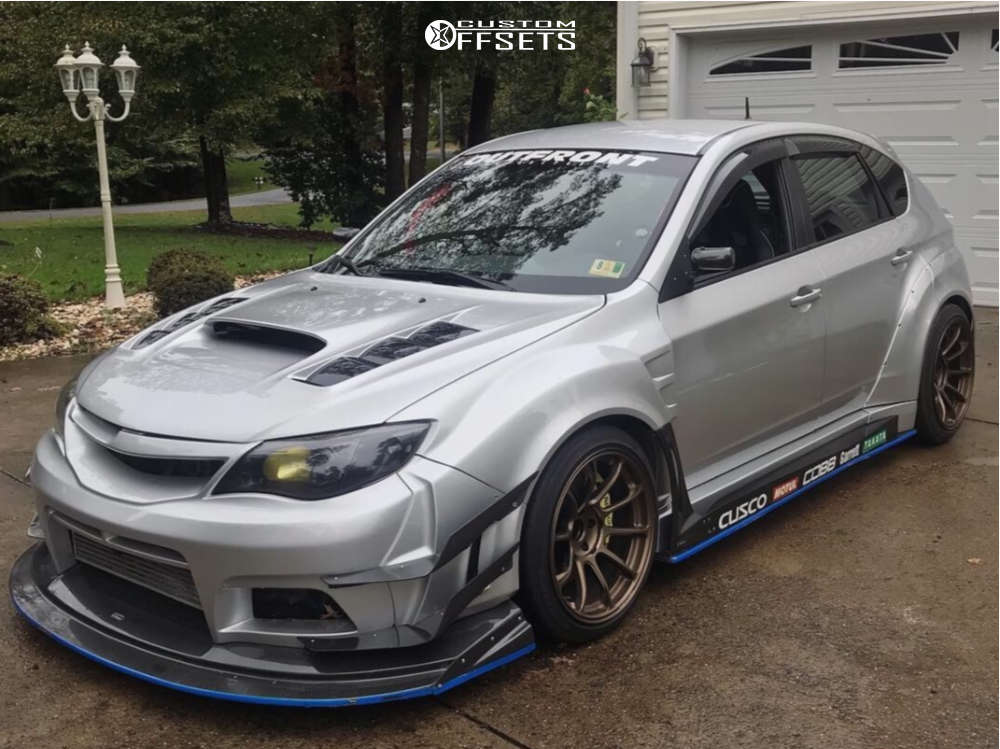 2008 Subaru WRX STI with 18x11 15 Volk Ze40 and 285/35R18