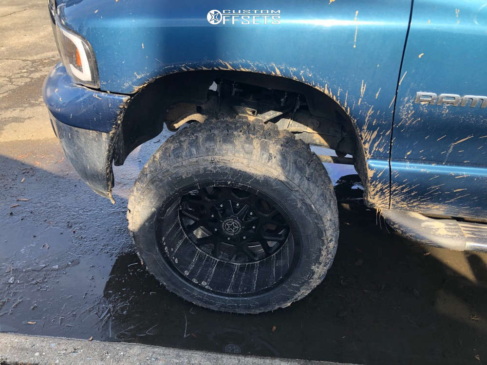 2003 Dodge Ram 1500 with 20x12 -44 Vision Rocker and 33/12.5R20 Federal ...