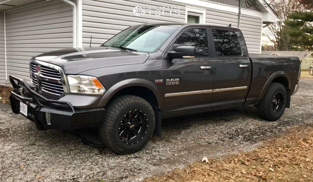 2015 Ram 1500 with 18x10 -24 Moto Metal Mo962 and 275/65R18 Falken
