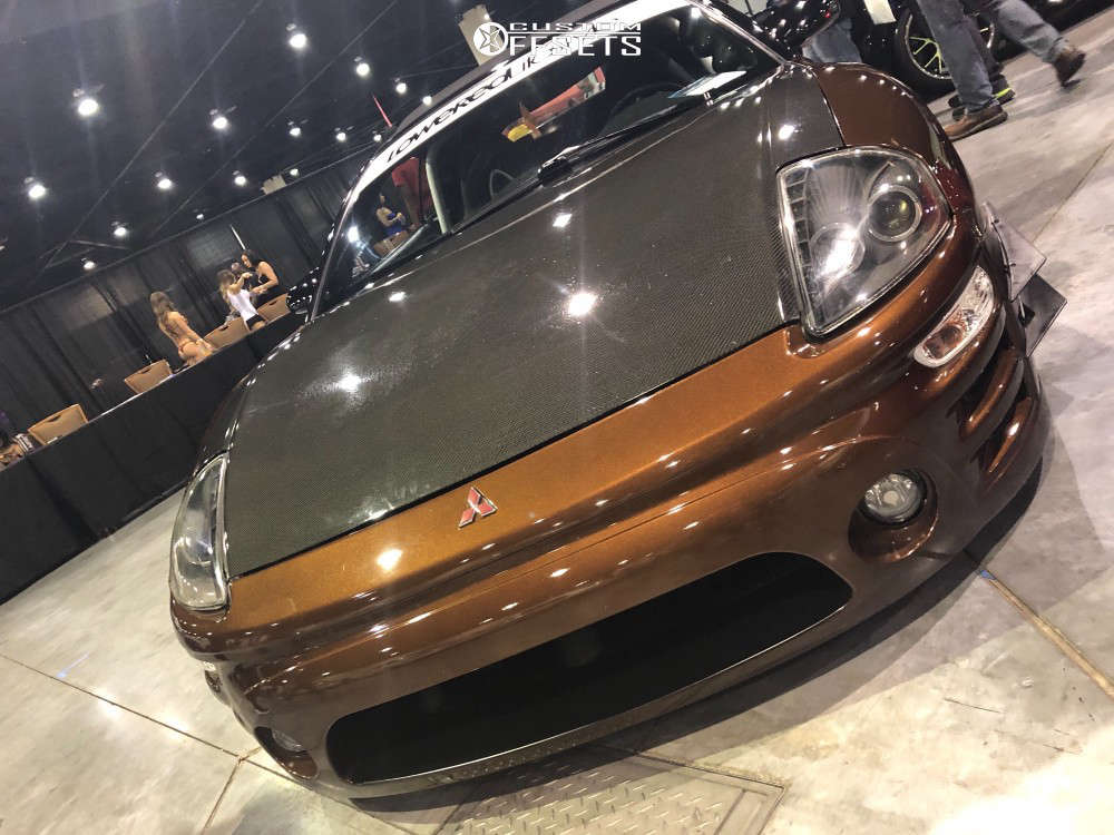 2000 Mitsubishi Eclipse with 18x8.5 30 ESR Sr08 and 215/35R18