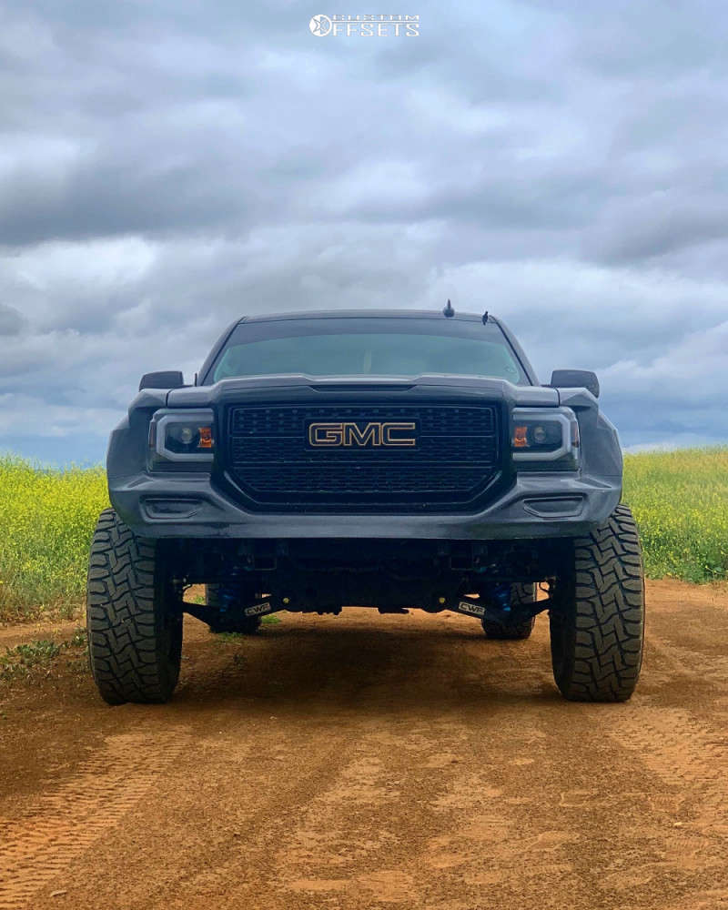 2015 GMC Sierra 1500 with 17x9 44 Method Mr106 and 37/13.5R17 Toyo