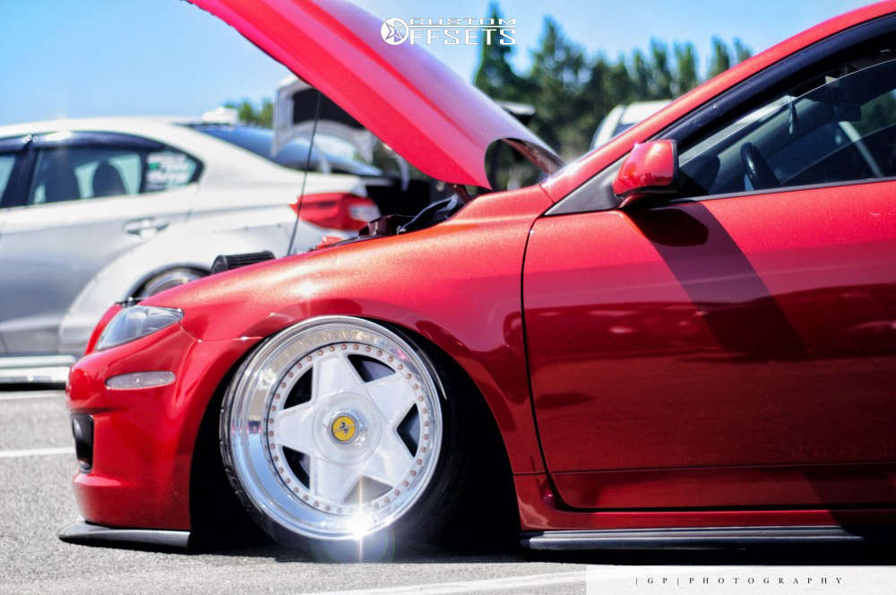 2006 Mazda MazdaSpeed6 with 18x9.5 12 Autostrada Modena and 215