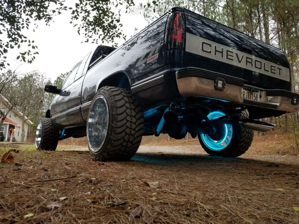 1998 Chevrolet K1500 with 22x14 76 Fuel Hostage and 33/12.5R22 AMP Mud