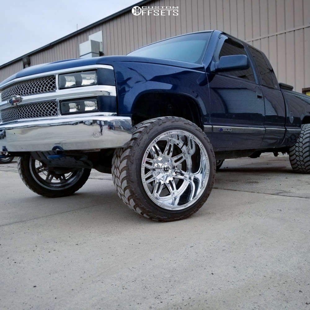 1998 Chevrolet K1500 with 22x14 76 Fuel Hostage and 33/12.5R22 AMP Mud
