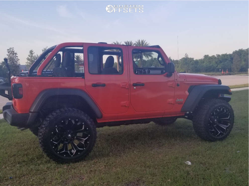 2019 Jeep Wrangler with 22x12 44 Fuel Assault and 35/12.5R22 Cooper