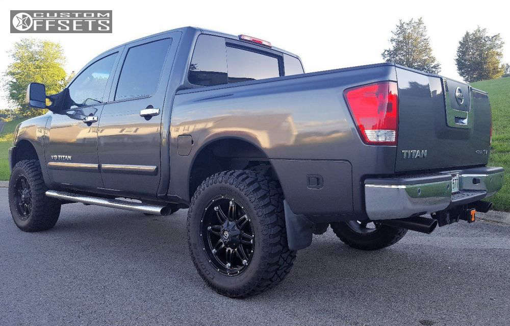 2011 Nissan Titan with 20x9 12 Fuel Hostage and 35/12.5R20 Cooper