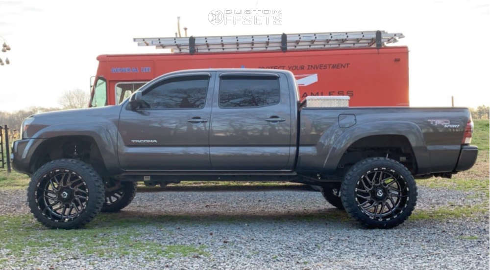 2011 Toyota with 22x12 44 TIS 544BM and 33/12.5R22 Fury Offroad