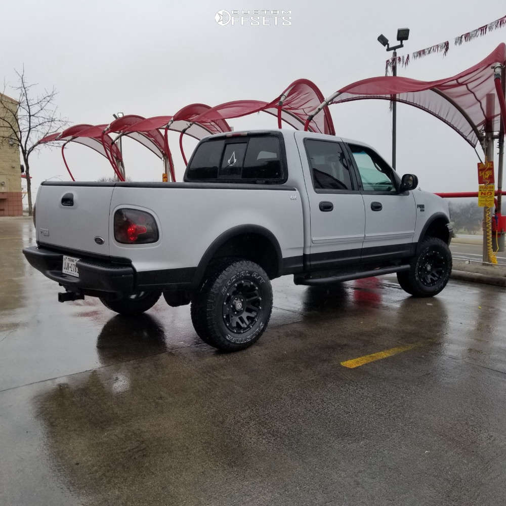 2001 Ford F-150 with 17x8.5 0 American Racing ATX Ax200 and 35/12.5R17  Suretrac Sierra A/t and Suspension Lift 4\, image size:1000x1000