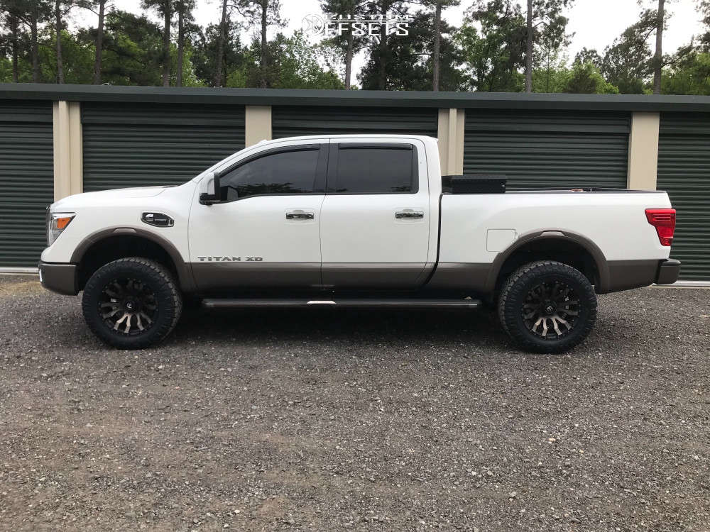 2016 Nissan Titan XD with 20x9 1 Fuel Blitz and 295/60R20 Nitto Ridge Grappler and Leveling Kit