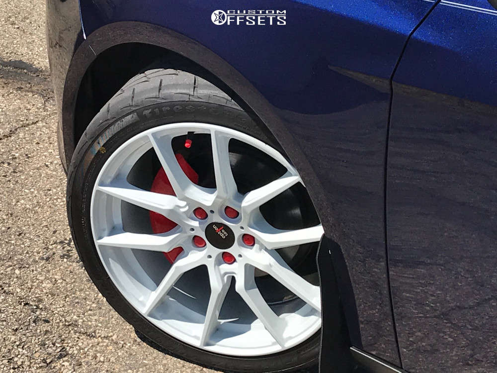 2017 Ford Focus with 18x8.5 40 Option Lab R716 and 255/35R18 Firestone ...