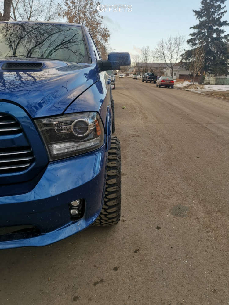 2015 Ram 1500 with 22x12 44 TIS 544V and 33/12.5R22 Mile King Mud
