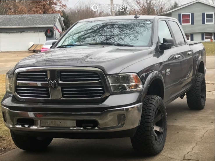 2015 Ram 1500 with 20x10 18 Fuel Beast and 33/12.5R20 Nitto Ridge