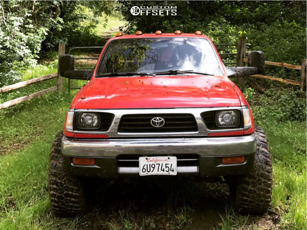 1997 Toyota with 15x10 44 American Racing ATX Ax201 and 33/12