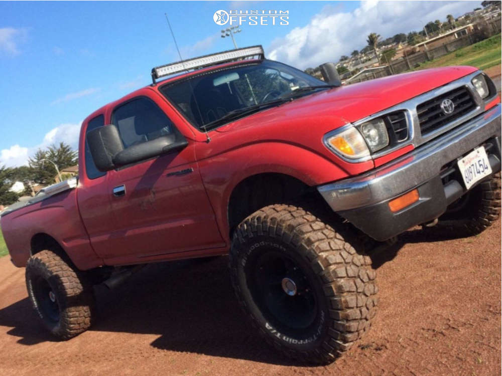 1997 Toyota with 15x10 44 American Racing ATX Ax201 and 33/12