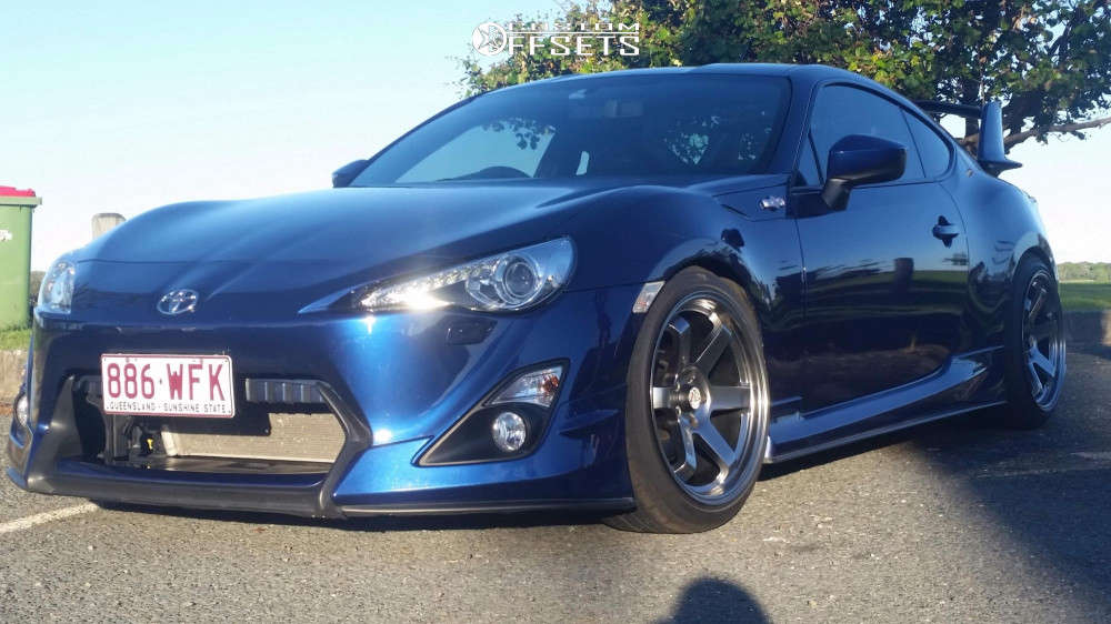 2012 Toyota 86 with 18x9.5 22 Rota Grid and 225/40R18 Bridgestone