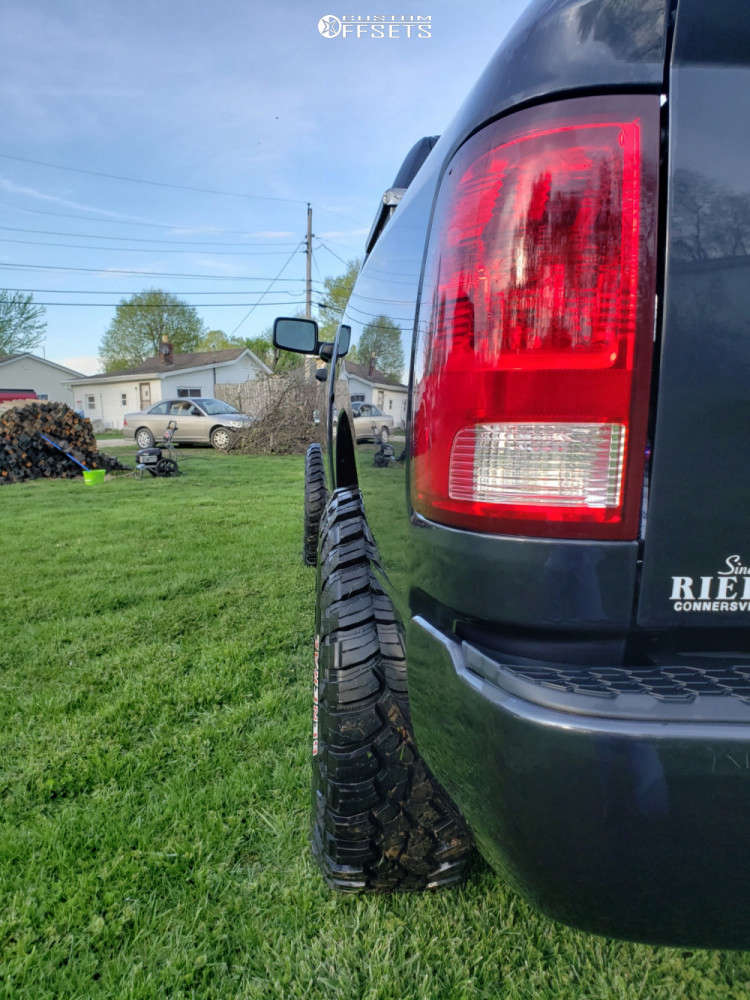 2015 Ram 1500 with 17x9 -12 Ballistic Razorback and 35/12.5R17 General ...