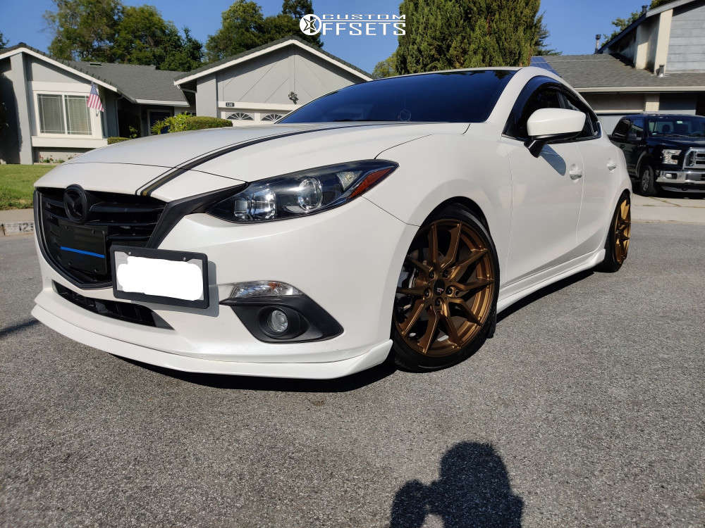 2015 Mazda 3 with 18x8.5 35 Option Lab R716 and 225/40R18 Hankook