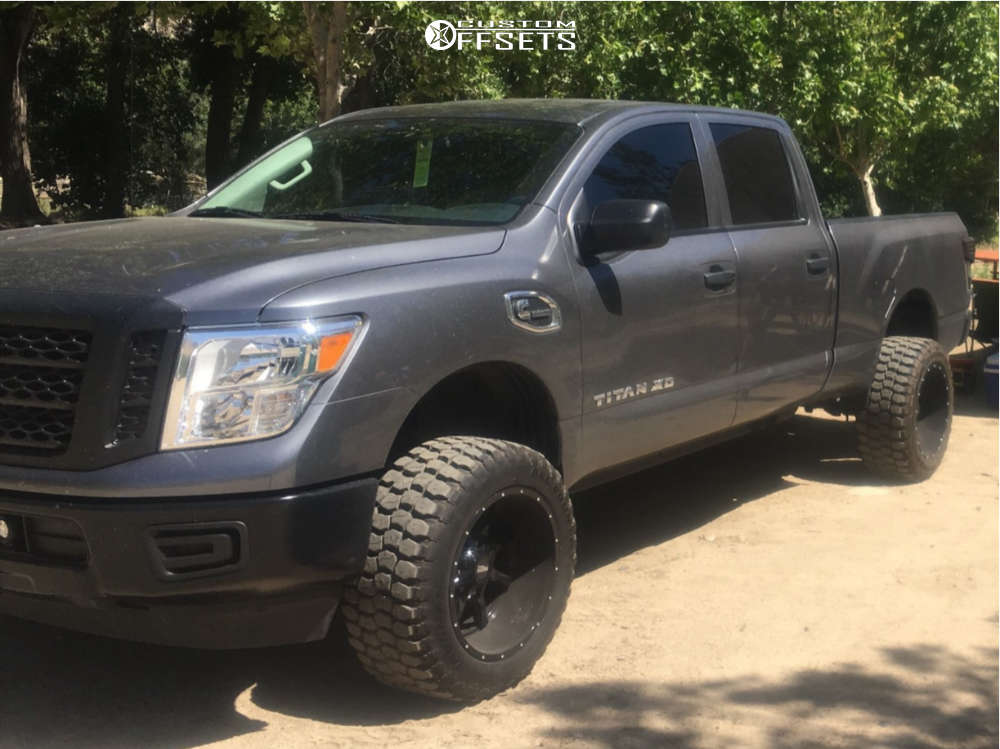 2017 Nissan Titan XD with 20x9 Moto Metal Mo970 and 33/12.5R20 Ironman