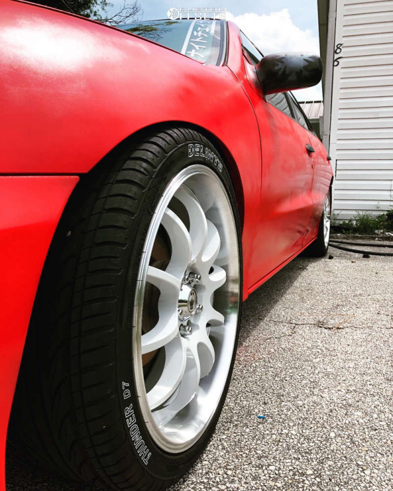 2003 Chevrolet Cavalier with 17x7 40 Konig Lightning and 205/40R17 ...