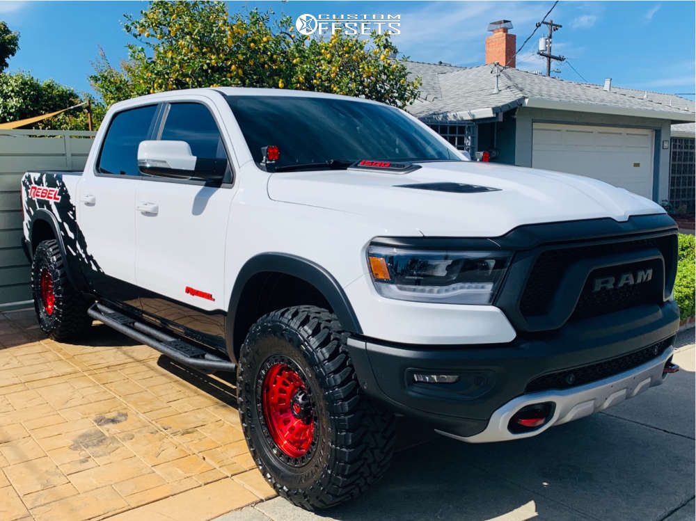 2019 Ram 1500 with 18x9 12 Fuel Zephyr and 35/12.5R18 Toyo Tires Open