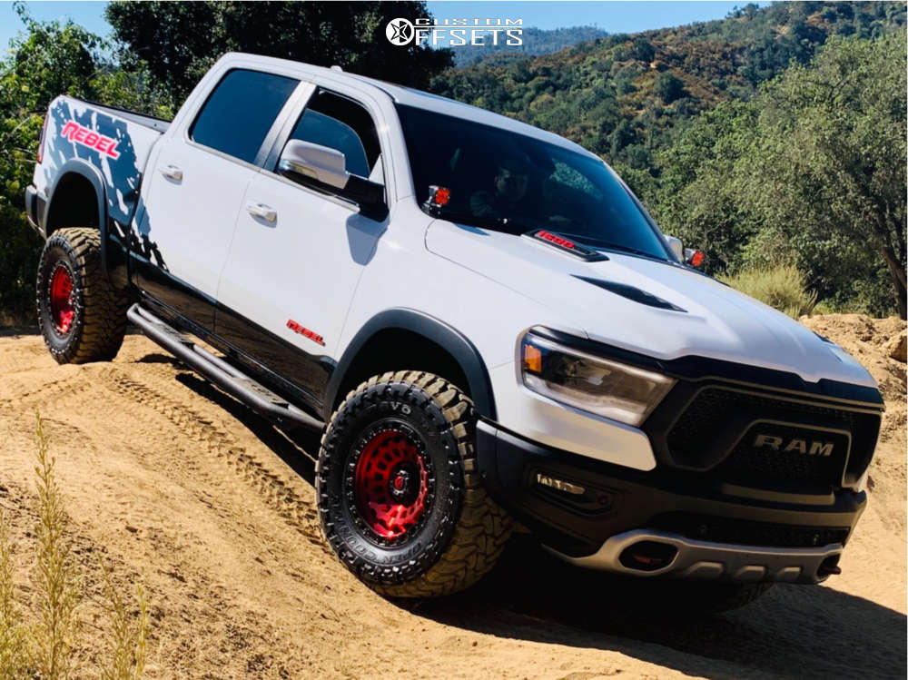 2019 Ram 1500 with 18x9 12 Fuel Zephyr and 35/12.5R18 Toyo Tires Open