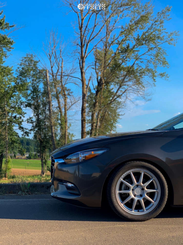 2017 Mazda 3 with 17x7 40 Motegi Mr140 and 235/45R17 Toyo Tires