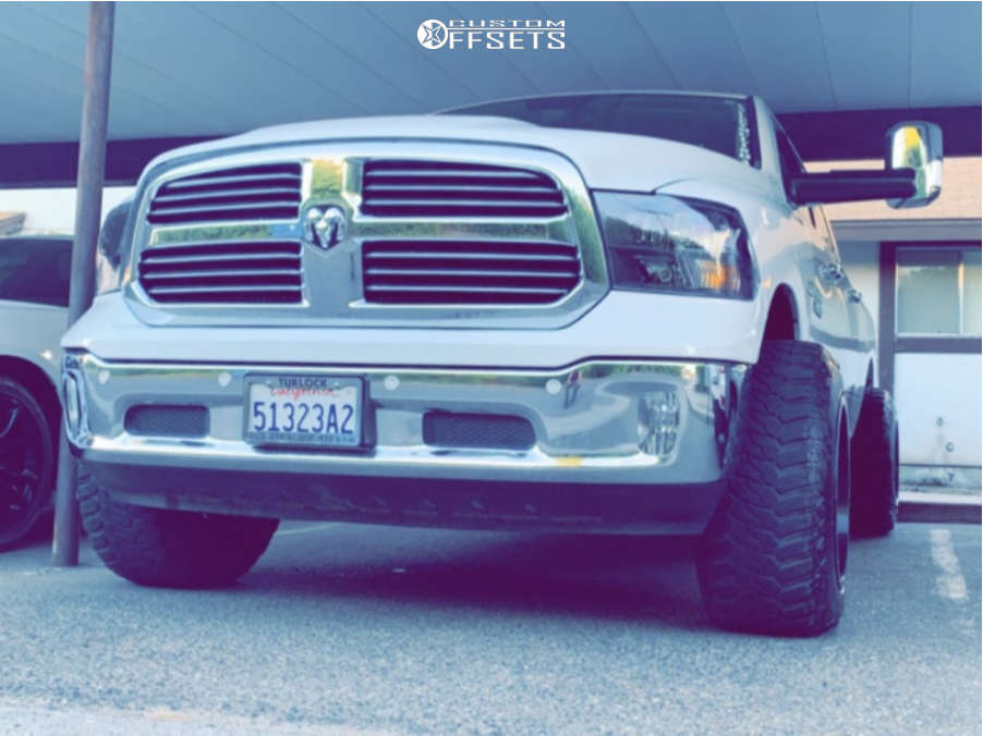 2017 Ram 1500 with 20x14 76 Fuel Maverick and 35/50R20 Maxtrek Mud