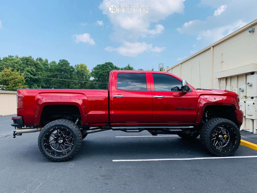 2019 GMC Sierra 2500 HD with 24x14 76 Hostile Sprocket and 38/15.5R24